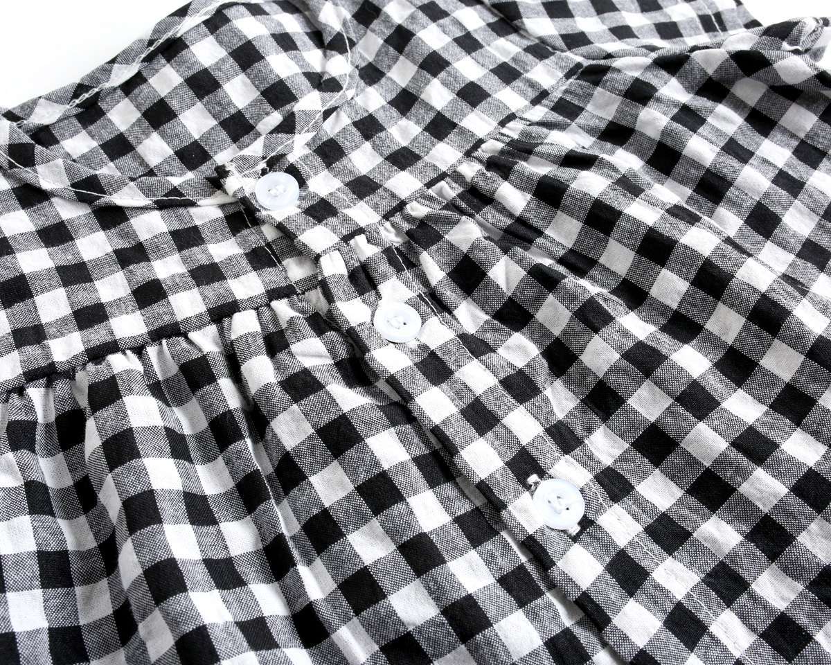 Black and white checkered fabric with buttons