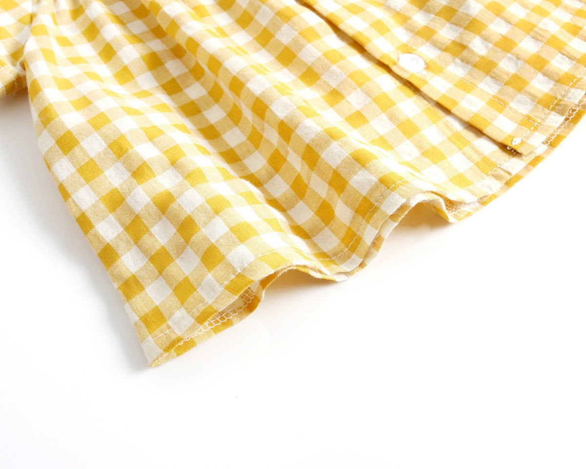 Yellow and white checkered fabric on a white background