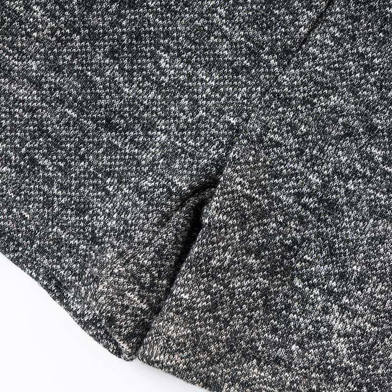 Close-up of gray textured fabric with a slight pattern