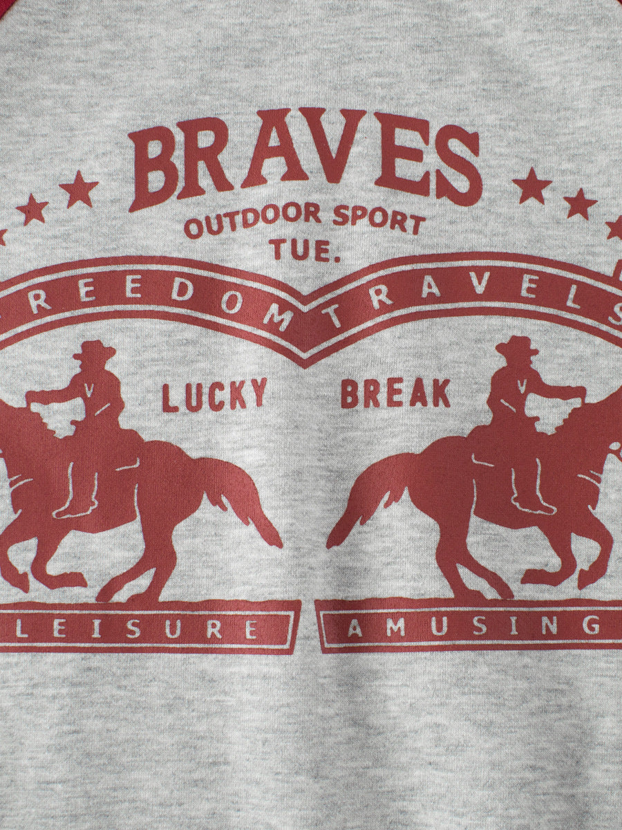 Gray sweatshirt with red graphic design featuring horses and text on a gray background