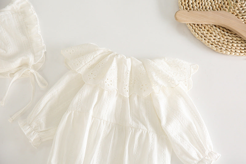 White blouse with ruffled sleeves on a light background