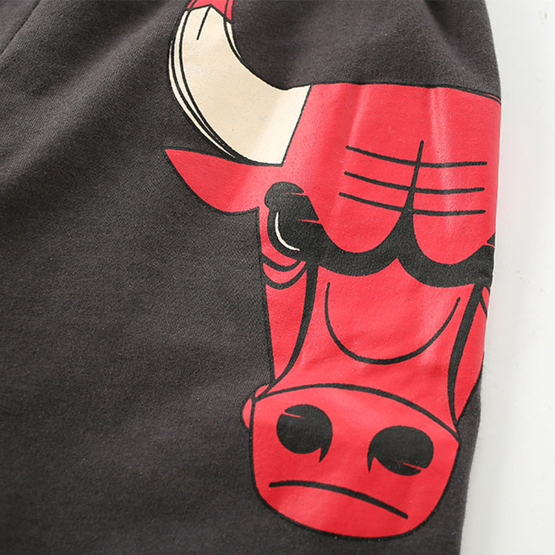 Black t-shirt with a red bull graphic on a white background