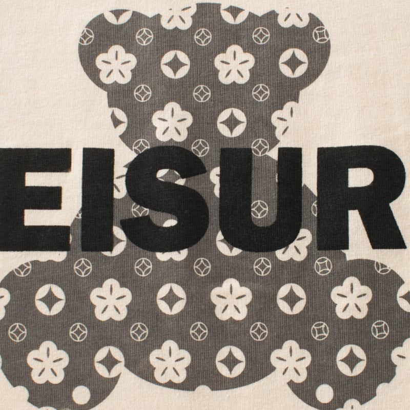 Text 'EISUR' on a patterned background with black and white design elements.