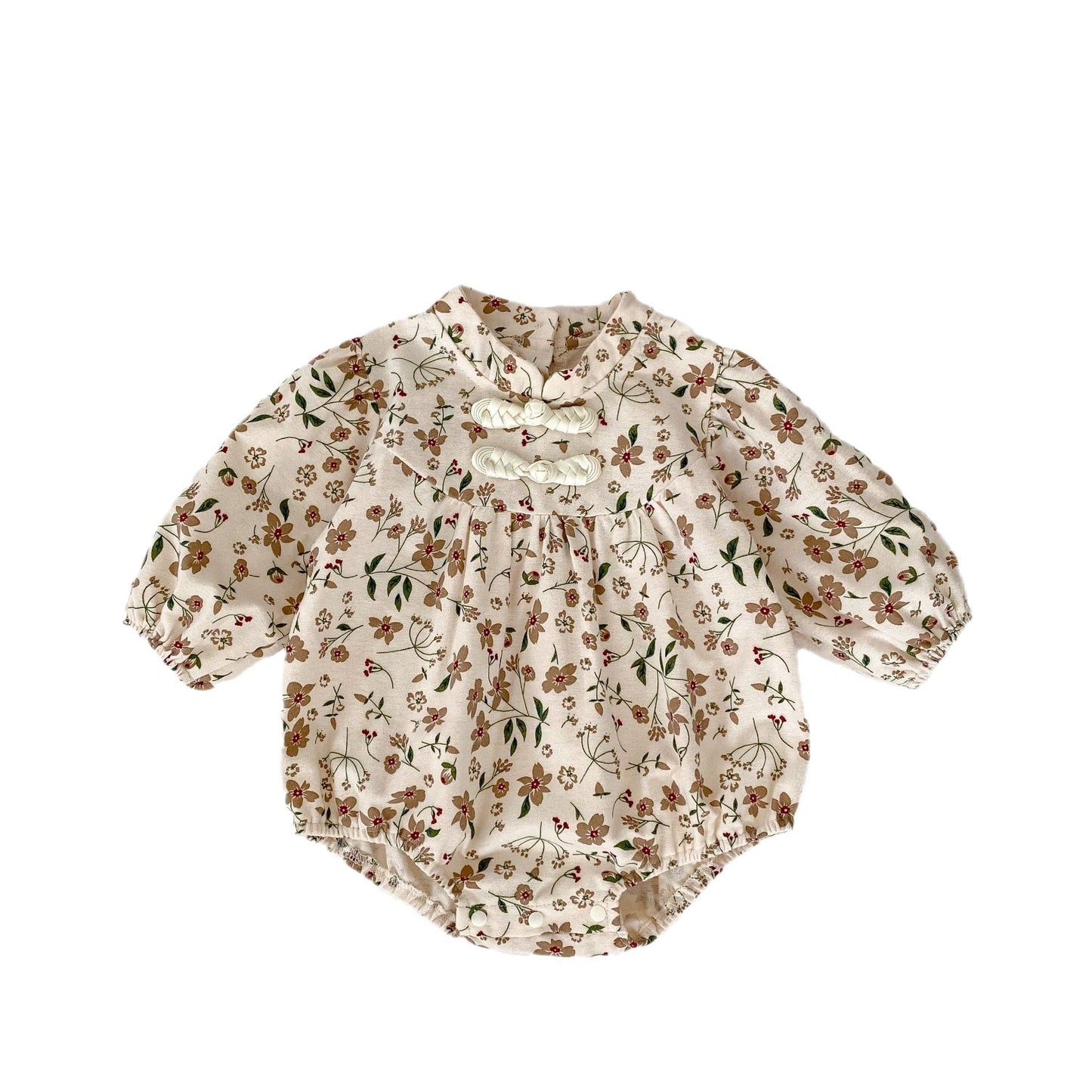 Floral blouse with puff sleeves on a white background