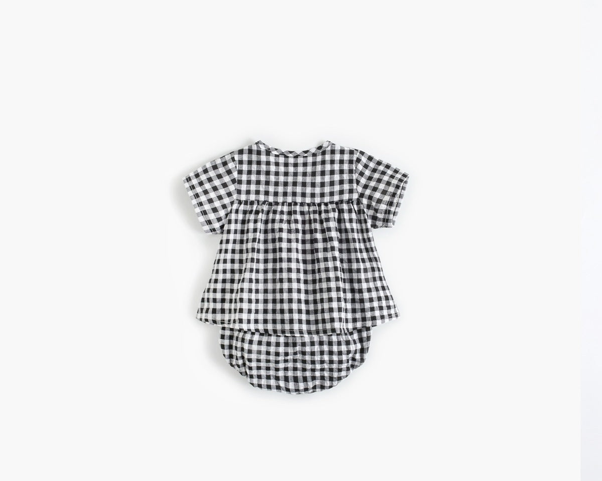 Black and white checkered outfit on a white background