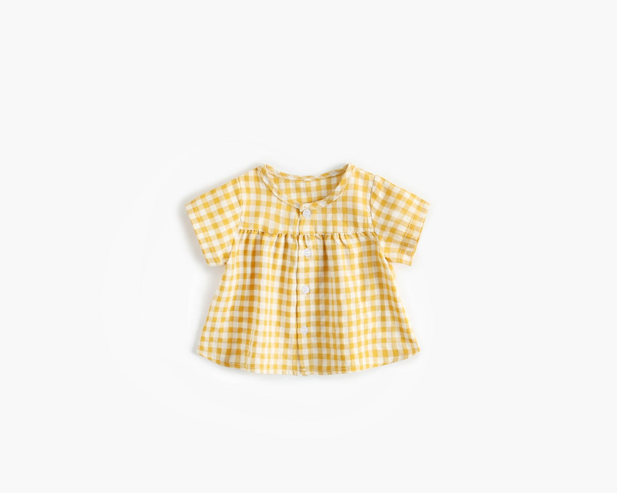 Yellow checkered blouse on a white background
