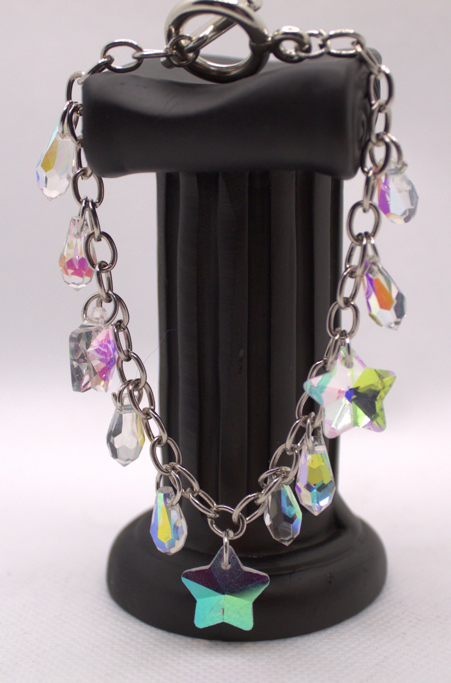 Iridescent Crystal Charm Bracelet with Star and Teardrop Accents