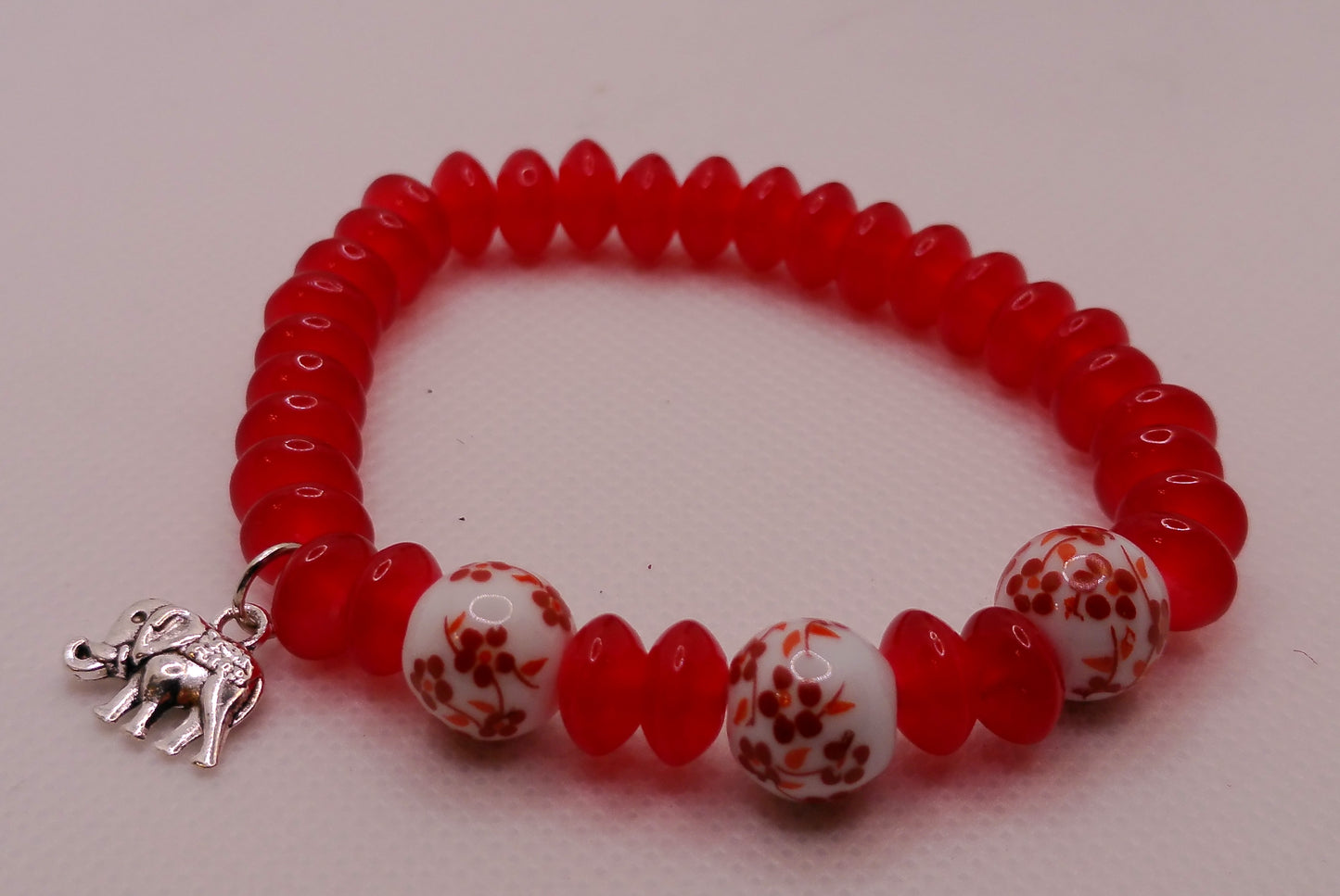 Red Blossom Elephant Charm Bracelet – Stretch Beaded Design