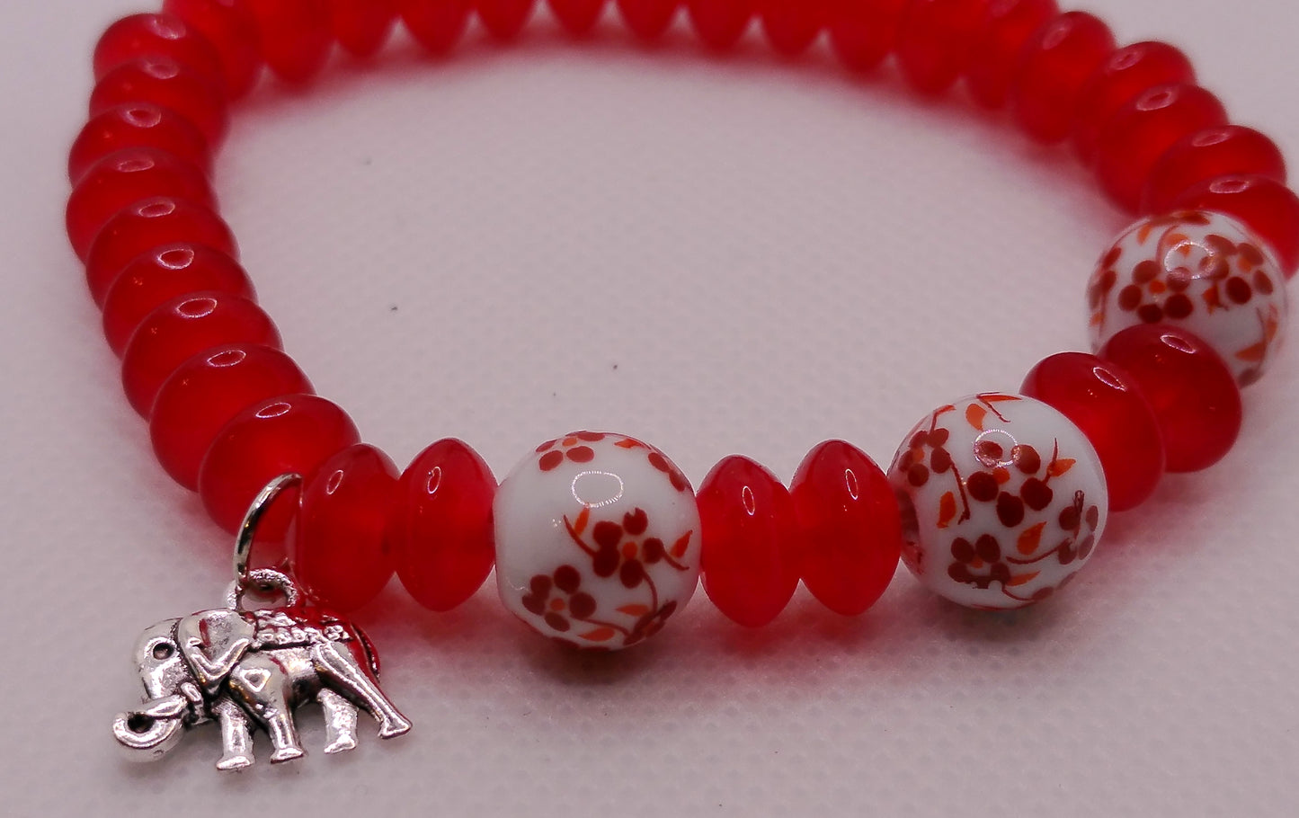 Red Blossom Elephant Charm Bracelet – Stretch Beaded Design