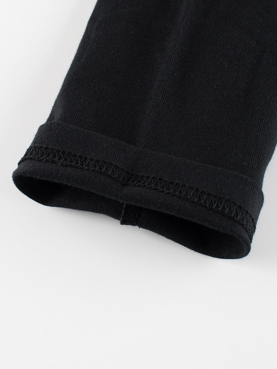 Close-up of a black fabric edge on a white background