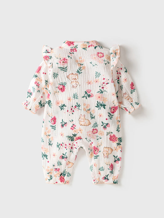 Floral baby romper on a light gray background