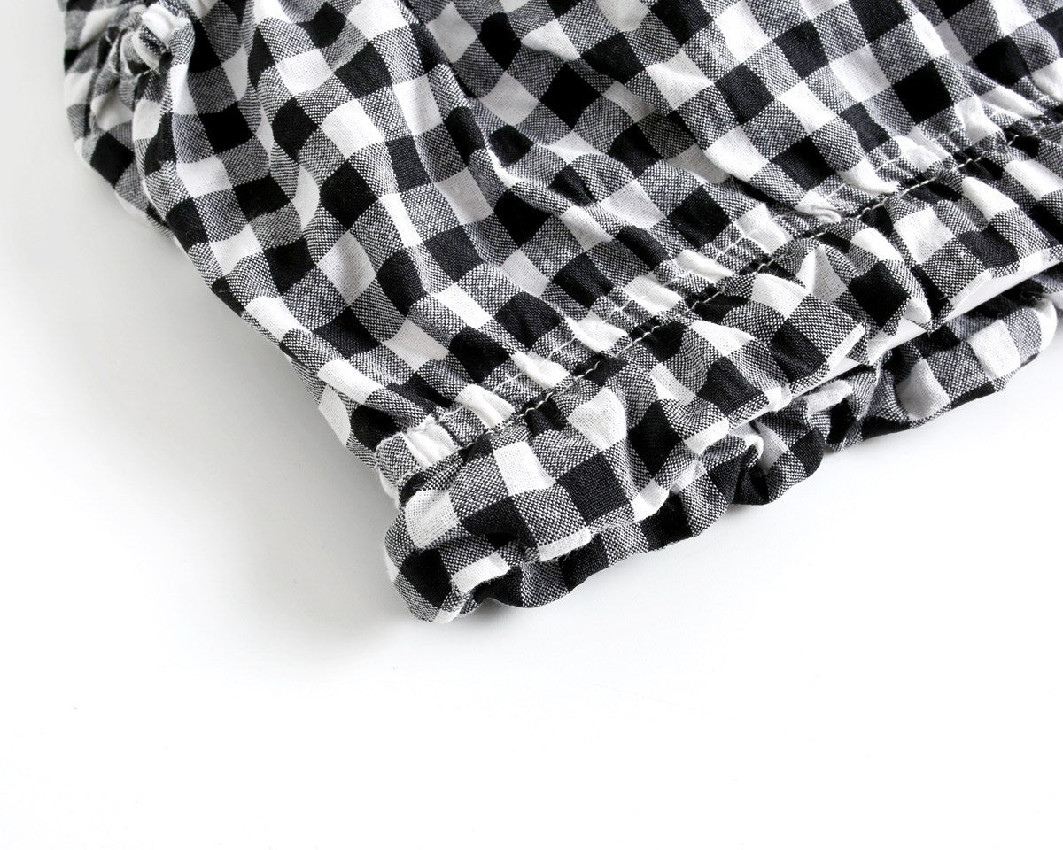 Black and white checkered fabric on a white background
