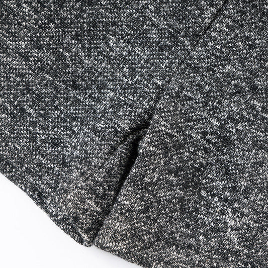 Close-up of gray textured fabric with a slight pattern